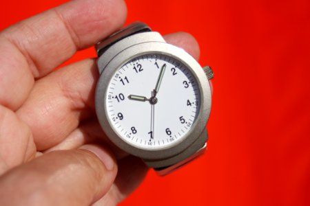 Person Holding Grey Round Analog Watch At 1007 photo