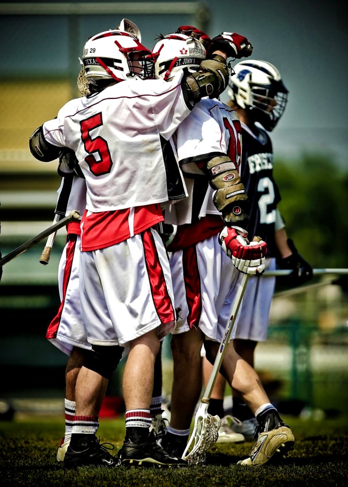 Lacrosse Players Celebrating Goal