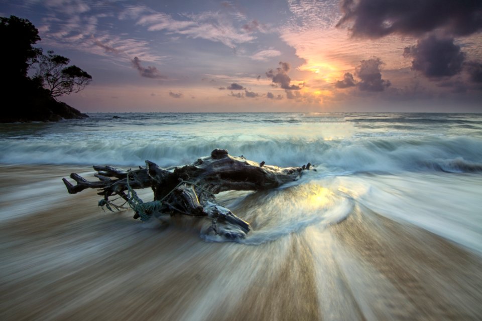 Scenic View Of Sea Against Dramatic Sky