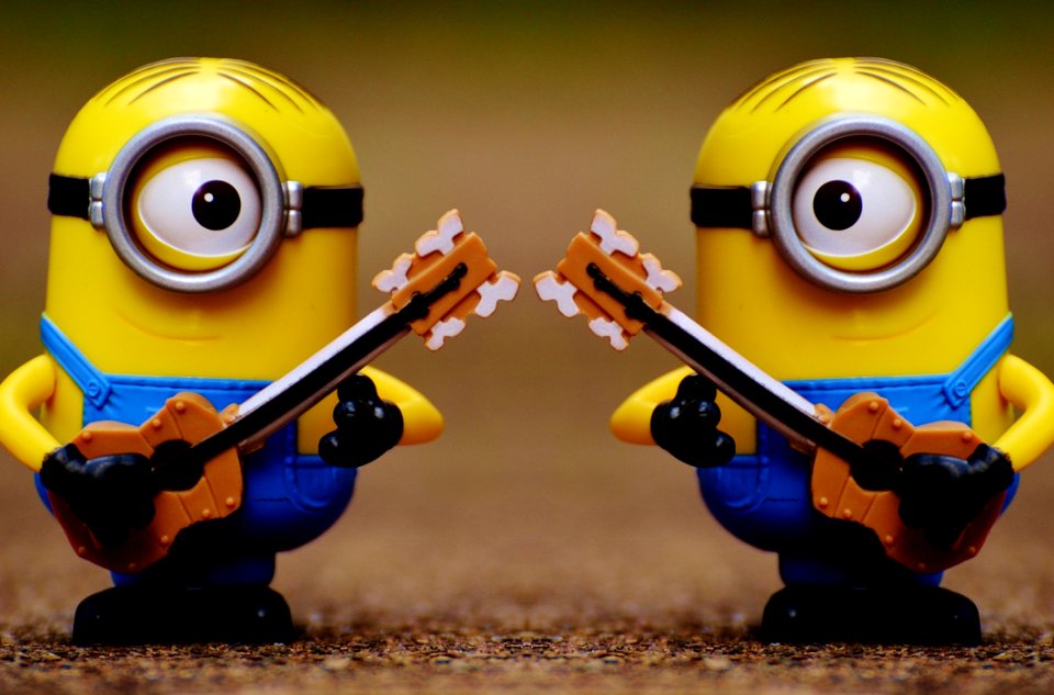 2 Minion Holding Guitar Toy photo