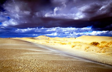 Storm Clouds Over Desert Landscape photo