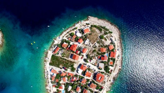Aerial View Of Houses On Small Island photo