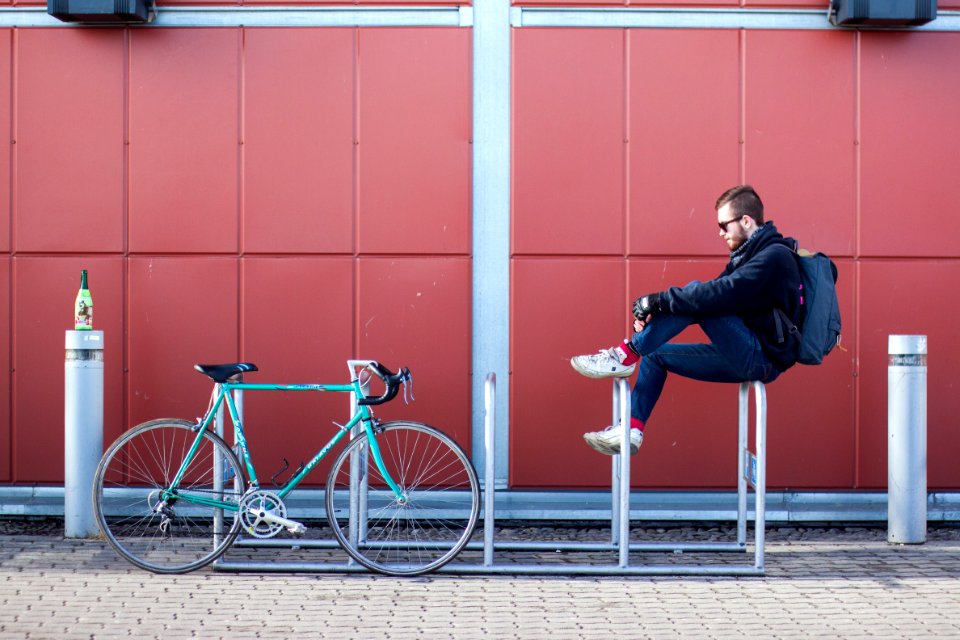 Man On Bicycle Rack photo