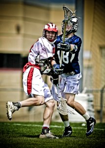 Two Men Playing Lacrosse