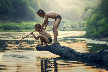 Two Asian Boys Fishing photo
