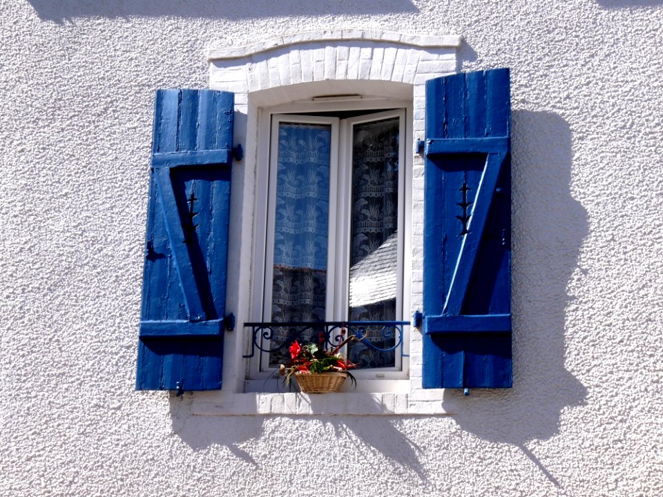 Window With Blue Shutters