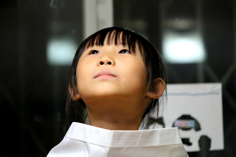 Black Haired Girl On White Shirt