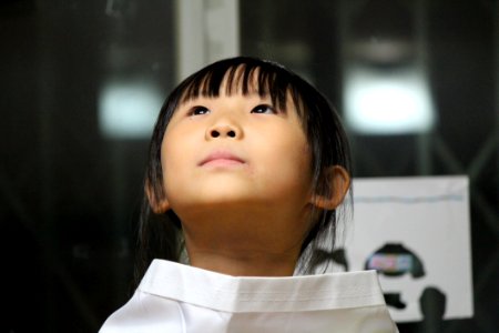 Black Haired Girl On White Shirt photo