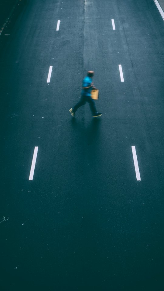 Man Crossing The Street