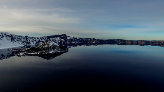 Lake And Snow Covered Landscape