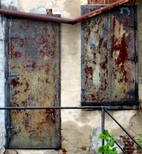Distressed Wall With Rusty Panels photo