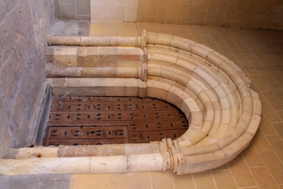 Wooden Door Under Stone Arches