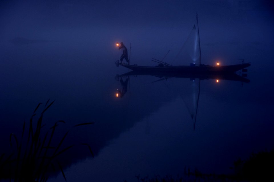 Long-Tail Boat At Night