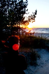 Girl Watching The Sunset