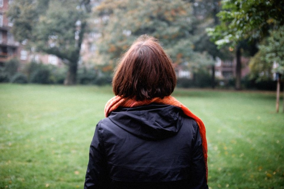 Woman In Autumn Park