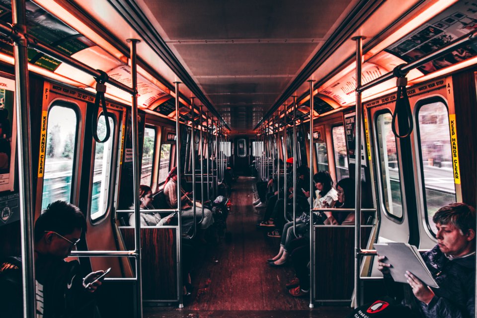 Commuters Sat On A Train