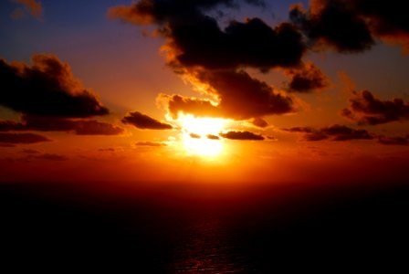 Sunset And Clouds Over Sea photo