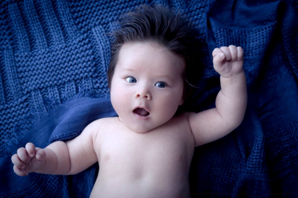 Baby Boy On Woollen Cover