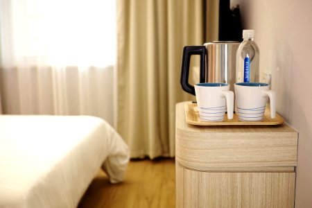 Water Kettle On Bedside Table photo