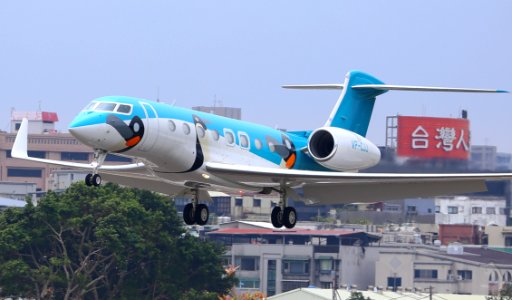 Commercial Airliner Over Urban Neighborhood