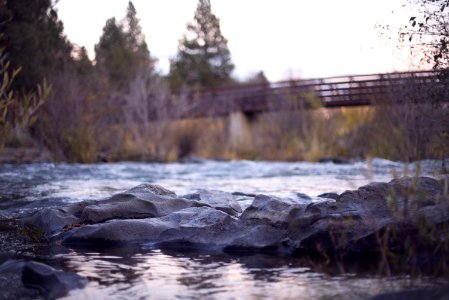 Rocks In Stream By Bridge