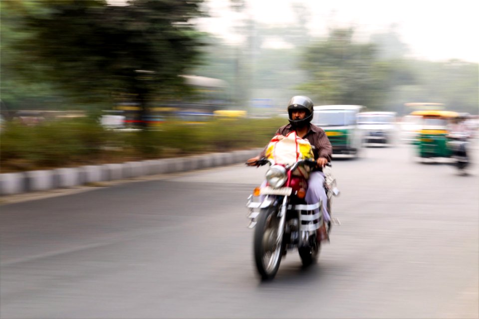 Man Riding On Motorcycle