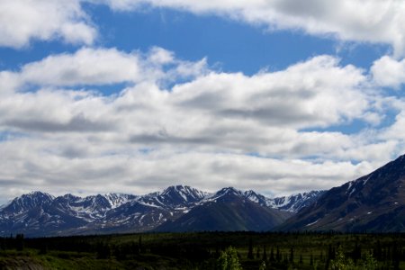 Landscape Photo Of Mountain Under Blue Cloudy Sky photo