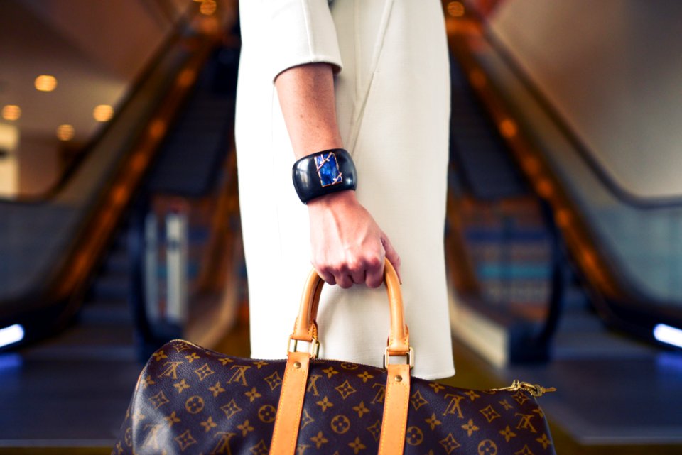 Woman Carrying A Bag photo