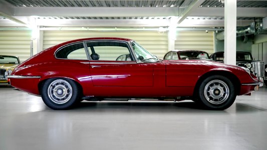 Black Red Classic Car In A Garage