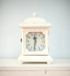 Antique Clock On Shelf photo