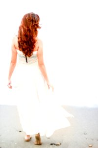 Redhead Woman On Beach