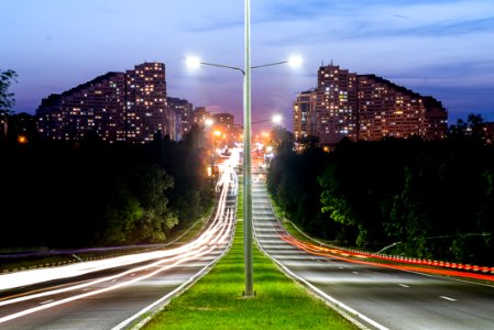 Grey Lamp Port Between Grey Concrete Road photo