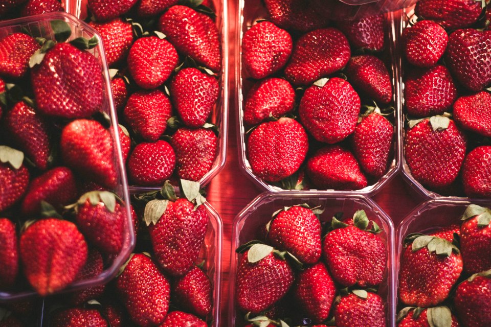 Strawberry Fruit On White Plastic Container