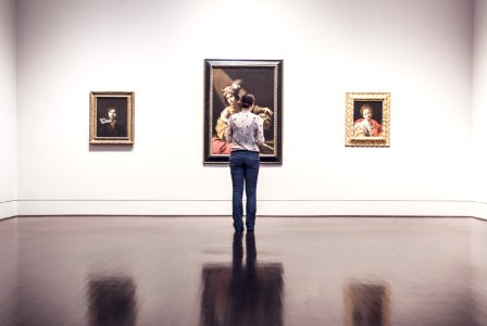 Woman At Art Exhibition Preview