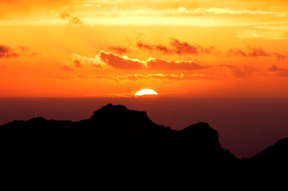 Silhouette Of Mountain Under Sunset