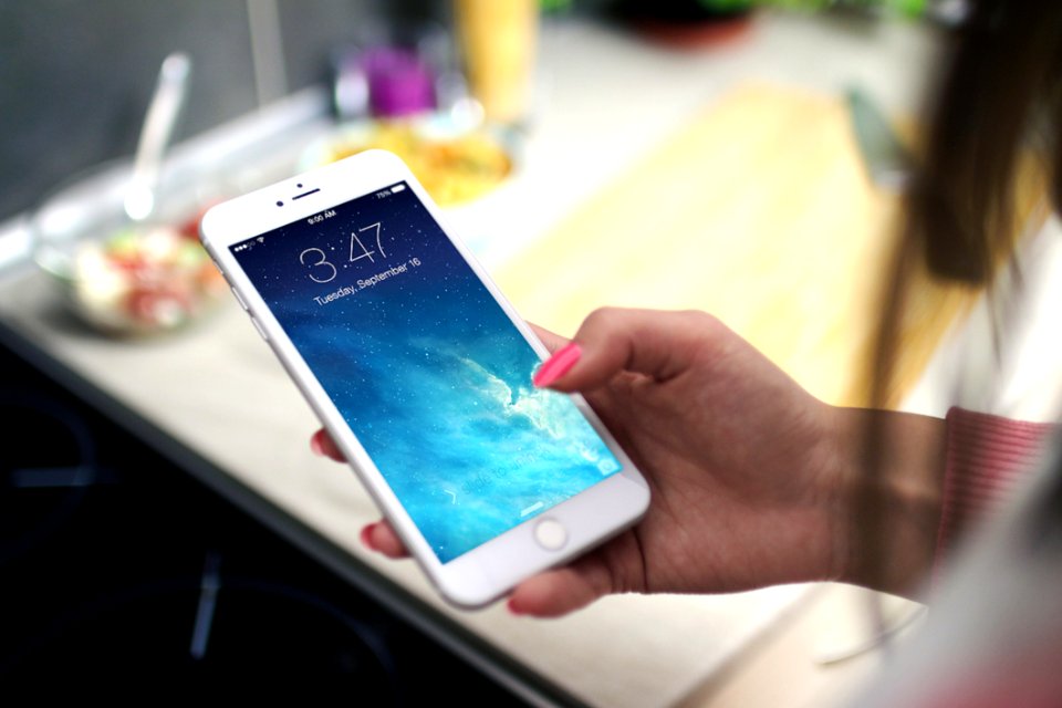 Woman Using IPhone 6