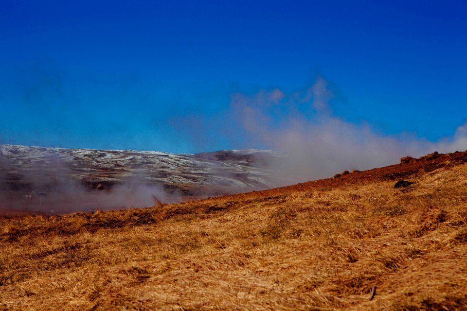 Smoke Rising Over Grassland