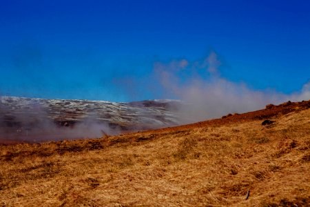 Smoke Rising Over Grassland photo