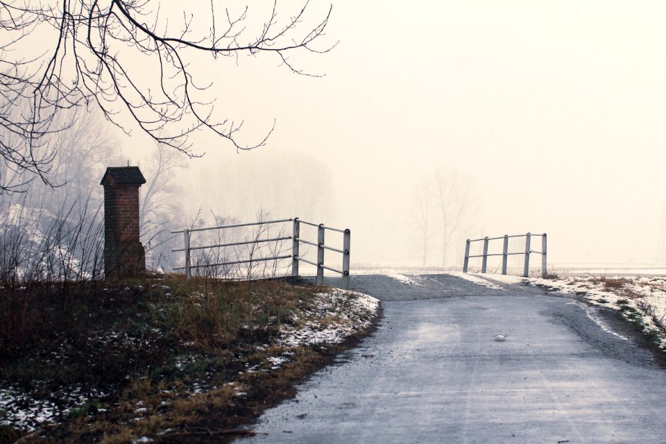 Road And Bridge In Snow Landscape