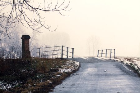 Road And Bridge In Snow Landscape