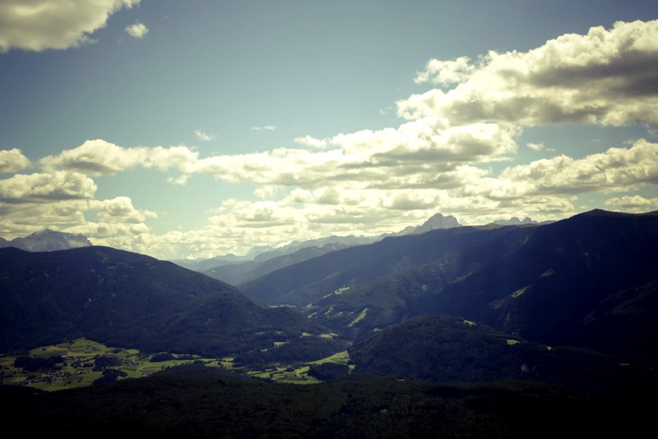 Black Mountain Range Under Gray Cloudy Sky During Daytime