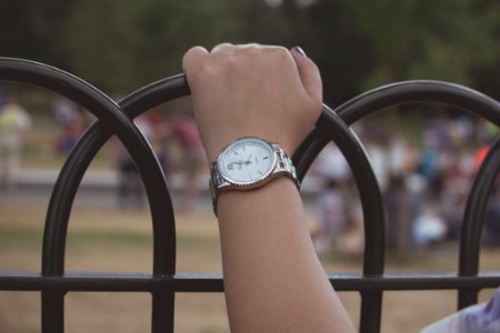Womans Hand Holding Railings