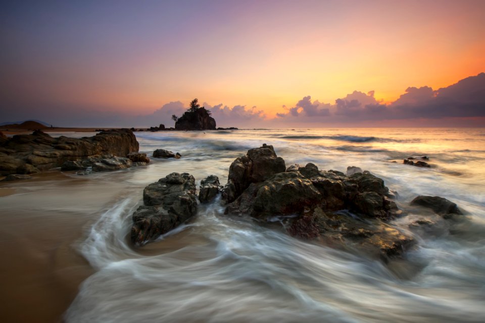 Stone In Seashore During Sunset photo