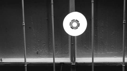 Lamp Hanging From Industrial Building