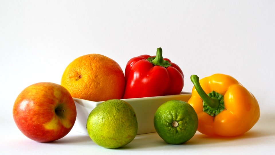 Red Apple Fruit Near Red Bell Pepper photo