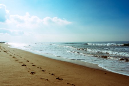 Footprints On Beach