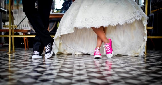 Woman Wearing Pink And White Low Top Shoes Dancing Beside Man