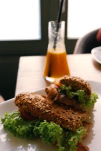 Brown With Green Vegetable Bread On White Ceramic Plate photo