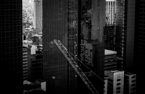 Grayscale Photo Of A High Rise Building photo