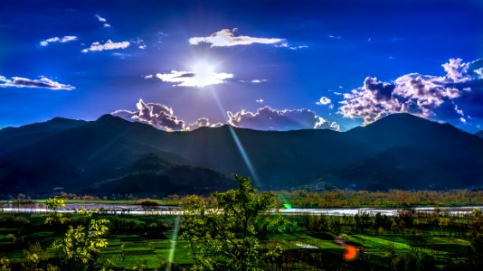 Sunlight Passing Through Grey Clouds photo